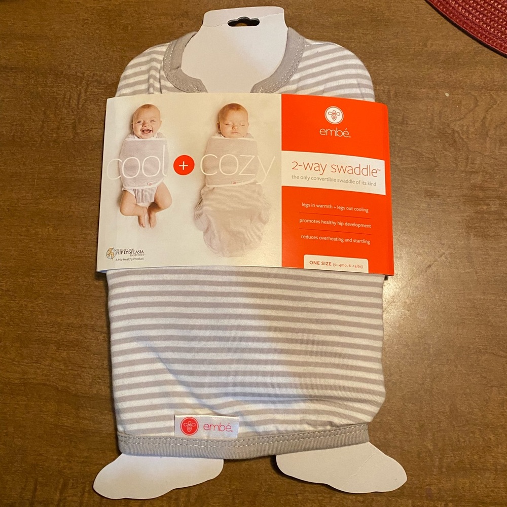 Embe Swaddle. New in original packaging.
